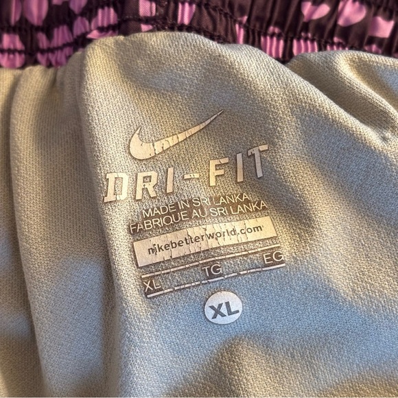 Women’s Nike Size L Purple Dots Running Shorts. Inseam 3”. Notes - Picture 7 of 8
